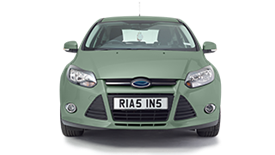 Mint green coloured car with a personalised Rias plate