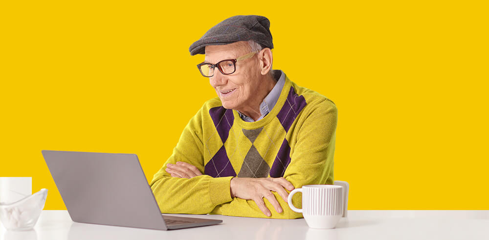 Elderly man on laptop